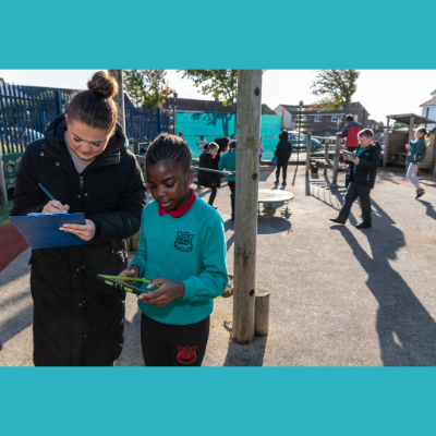 Student and volunteer doing survey @ Belfast Hills - 400x400